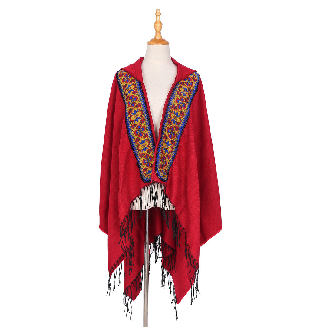 Damen Kapuzenponcho aus Wollmix mit kontrastreicher Blumenstickerei und Fransensaum Drune