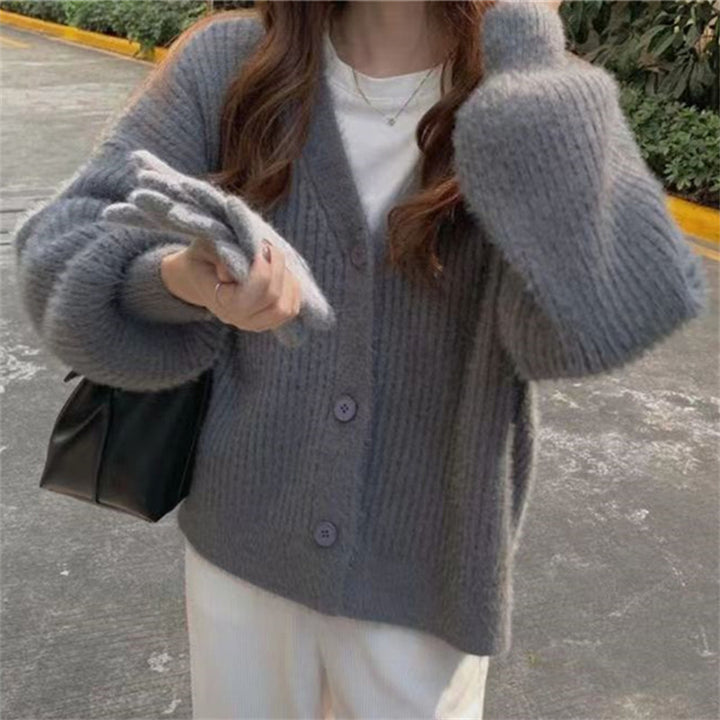 Damen kuschelige Strickjacke mit moderne Knopfdetails und oversized Schnitt Drune