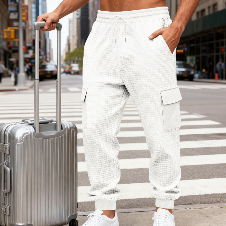 Herren Cargo-Jogginghose mit markanter Waffelstruktur, elastischem Bund und großen Klappentaschen Drune