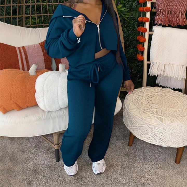 Damen sportliches Set aus cropped Kapuzenpullover und lässigen Jogginghosen mit Kordelzug