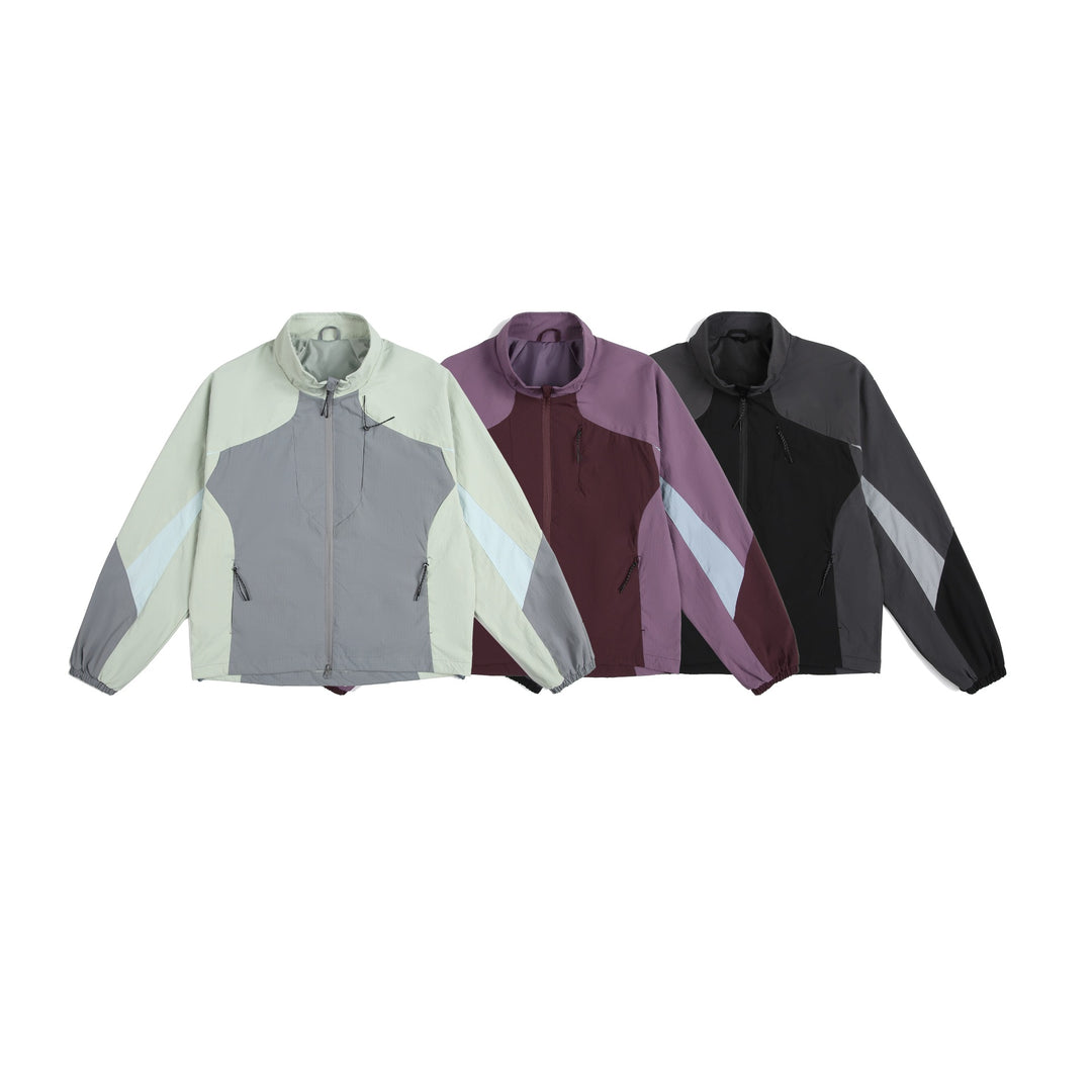 Unisex Leichte Windjacke mit hohem Kragen, Farbmix‑Paneelen und verstellbarem Saum Drune