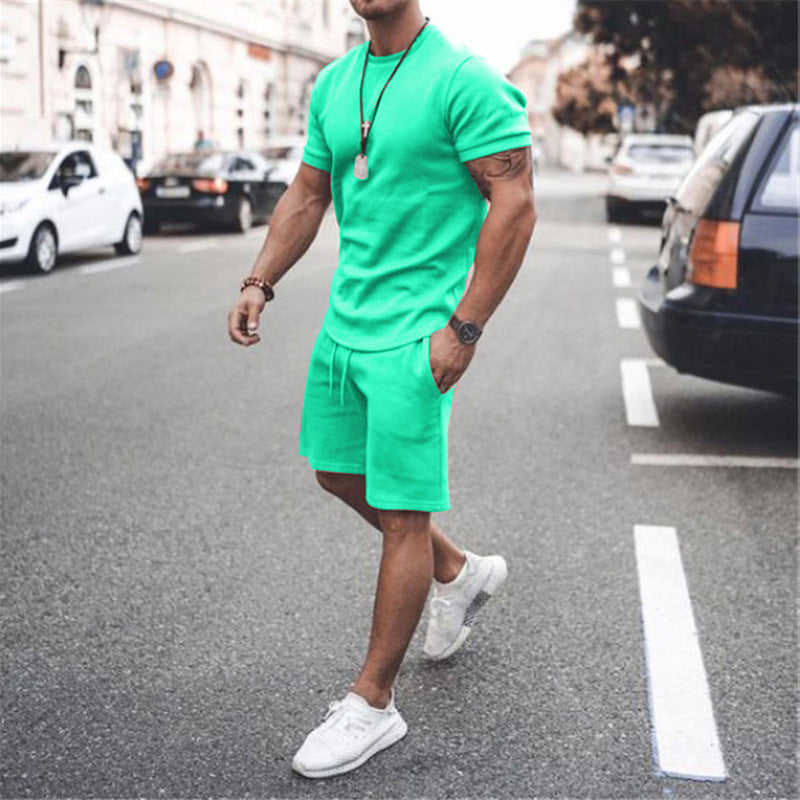 Herren nan figurbetontes Kurzarmshirt mit verstärkter Schulternaht und elastischer Kordelzug-Bermuda aus Stretchjersey Drune