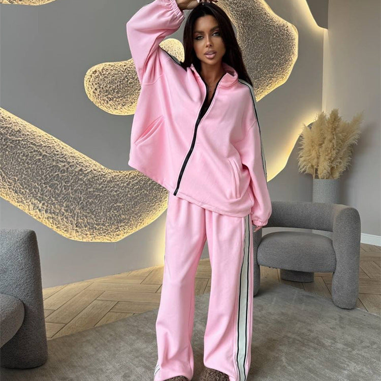 Damen weiches Oversize-Zweiteiler Trainingsset mit Reißverschlussjacke und weiter hochgeschnittener Jogginghose mit Kontraststreifen Drune