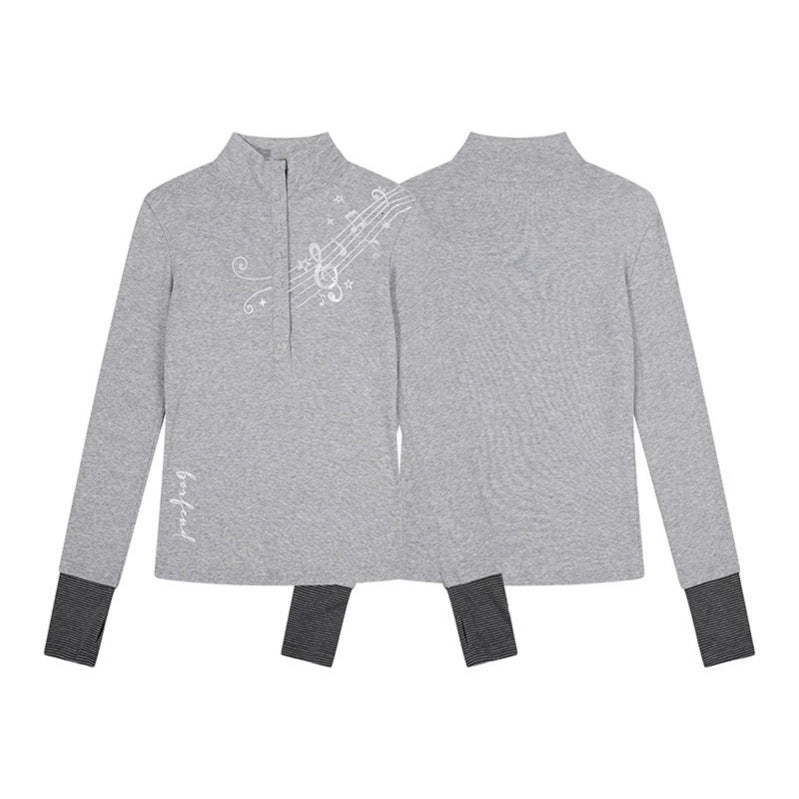 Damen Langarm-Poloshirt mit Stehkragen, Knopfleiste und Noten-Print Drune