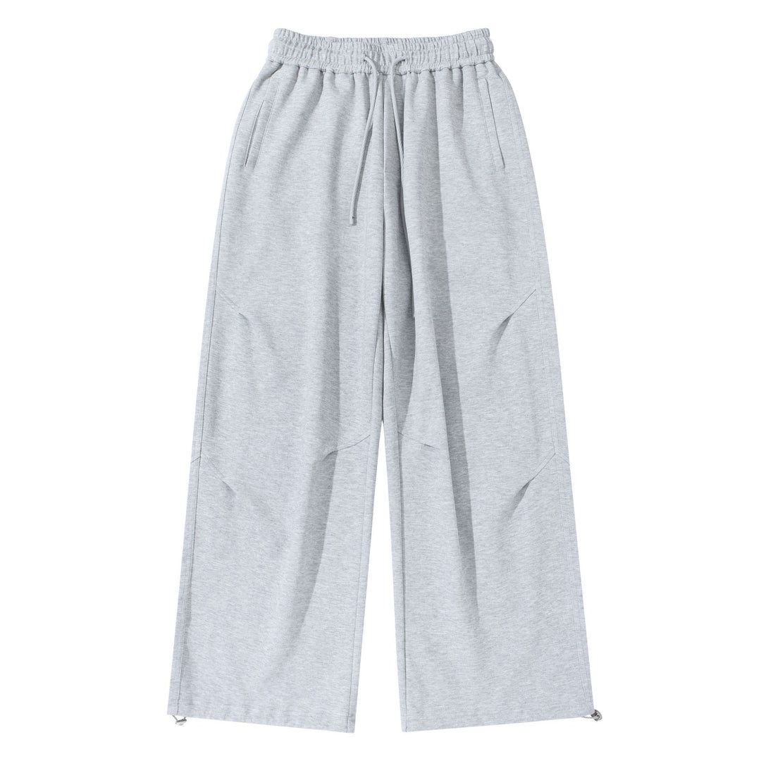 Unisex Weite French‑Terry Sweatpant mit elastischem Tunnelzugbund, Seitentaschen und verstellbarem Saum Drune