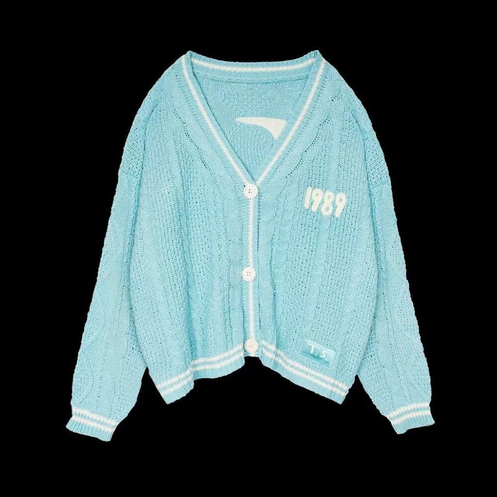 Damen nan kurz geschnittene Strickjacke mit V-Ausschnitt, Kontrastpaspel und oversized Ärmeln Drune