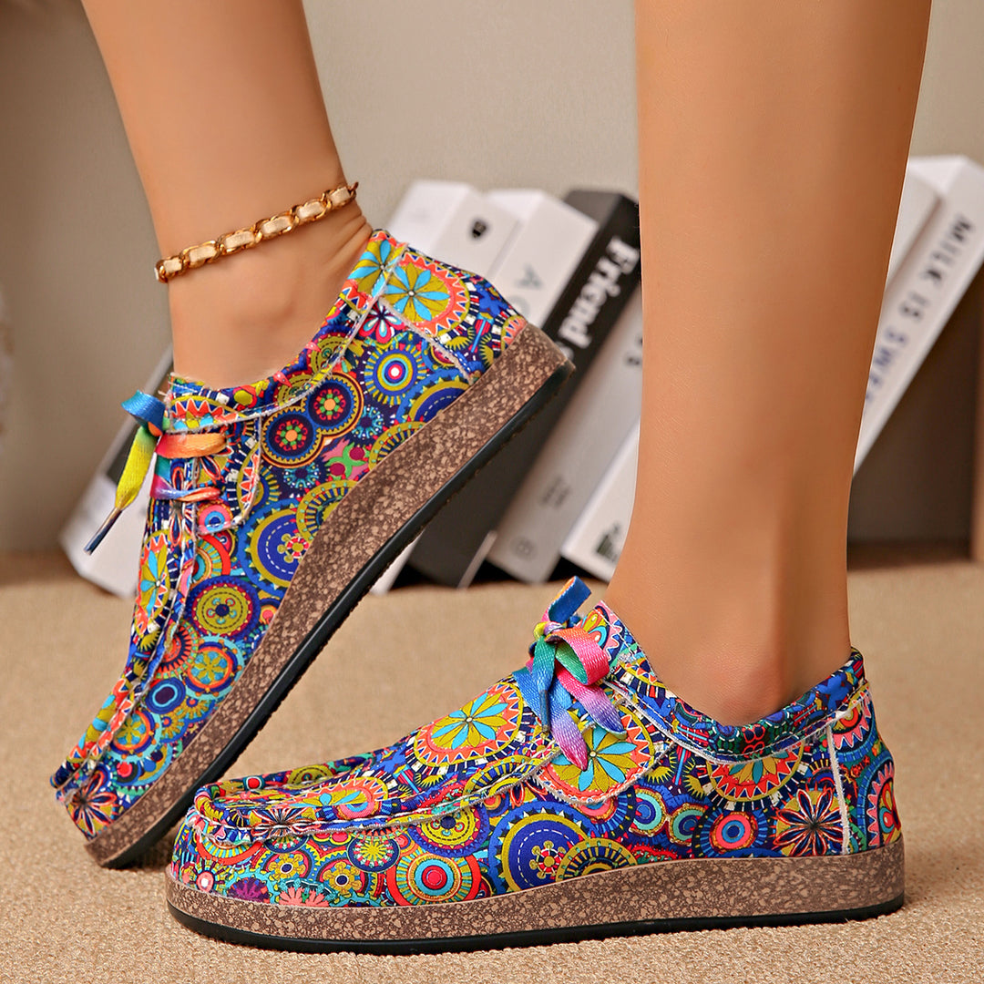 Damen Bequeme Plateau-Slipper im Ethno‑Print mit Korkoptik‑Sohle Drune