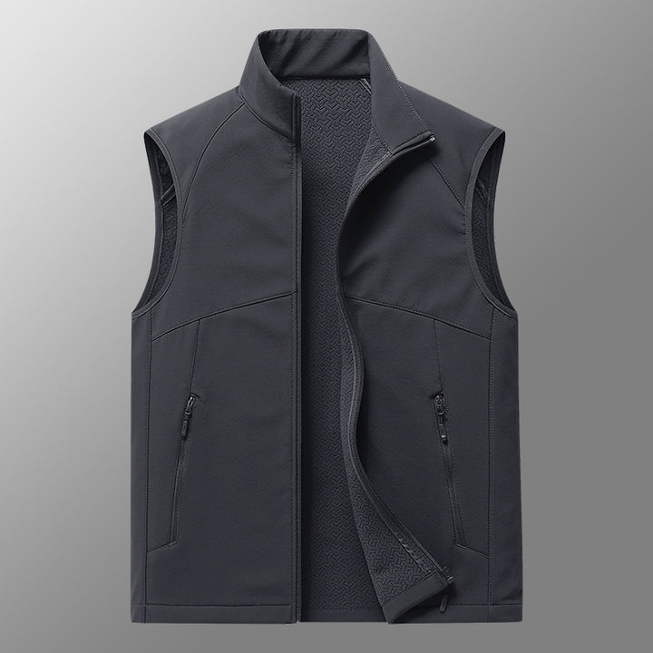 Herren Softshell-Weste mit Stehkragen, winddichter Performance-Softshell und strukturierter Innenseite Drune