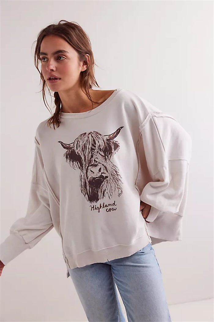 Damen oversized Sweatshirt mit Rüben-Print, ausgefransten Nahtakzenten und Daumenlochärmeln Drune