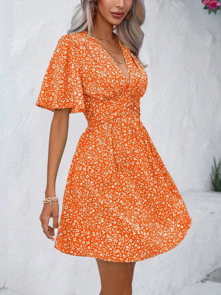 Damen Blütenmuster Kleid mit V-Ausschnitt und kurzen Ärmeln Drune
