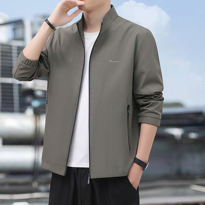 Herren Leichte Alltags-Softshelljacke mit Stehkragen, windabweisender Membran und Reißverschlusstaschen Drune