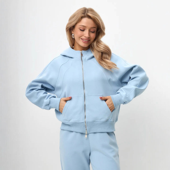 Damen entspanntes Fleece-Zweiteiler Set mit Raglan-Kapuzenjacke, durchgehendem Reißverschluss und gerader Relax-Jogginghose Drune