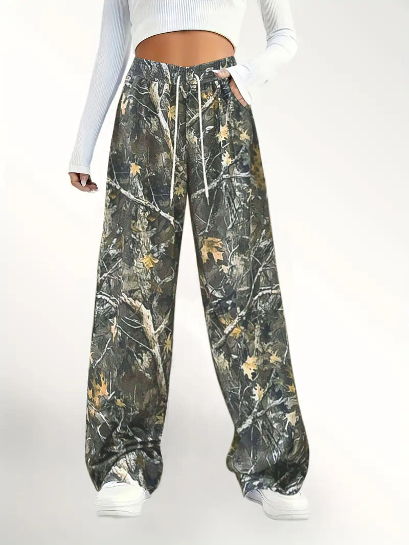 Damen Weite Palazzo-Loungehose im Camouflage-Blattmuster mit Elastikbund, Tunnelzug und Eingrifftaschen Drune