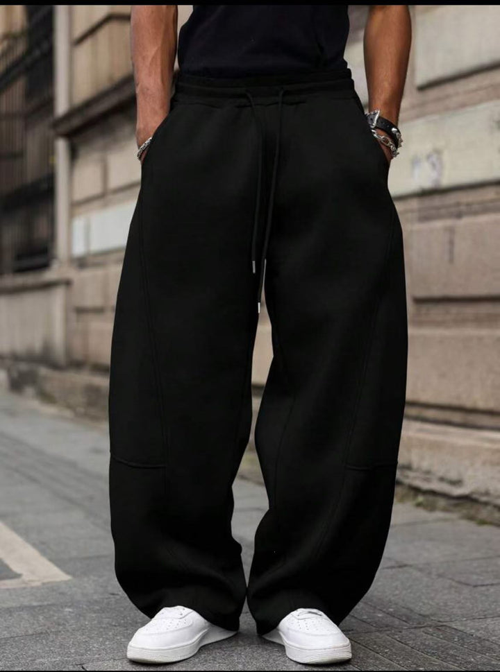 Herren weite Sweatpants im Baggy Cut mit elastischem Bund, Tunnelzug und Eingrifftaschen Drune