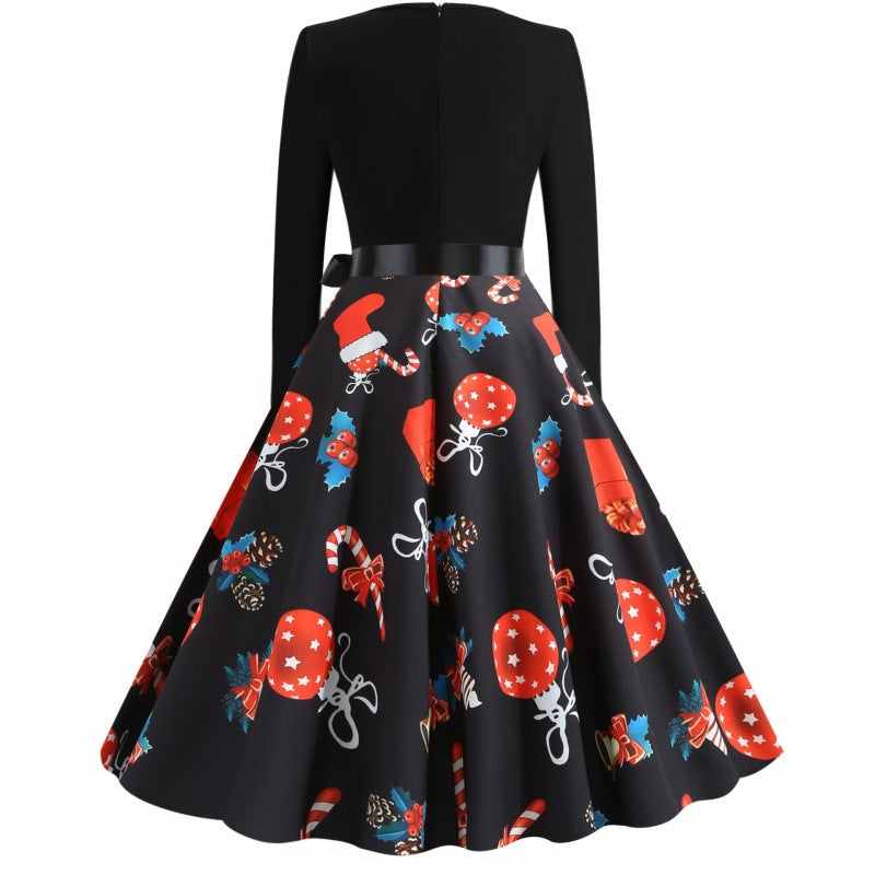 Damen Retro Swingkleid mit Jersey‑Oberteil, taillierter Satin‑Schärpe und festlichem Print Drune