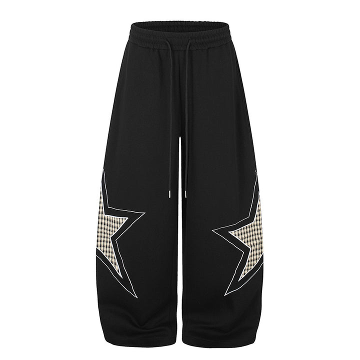 Damen weite Palazzo-Sweathose mit Stern-Applikationen und Karo‑Einsätzen Drune