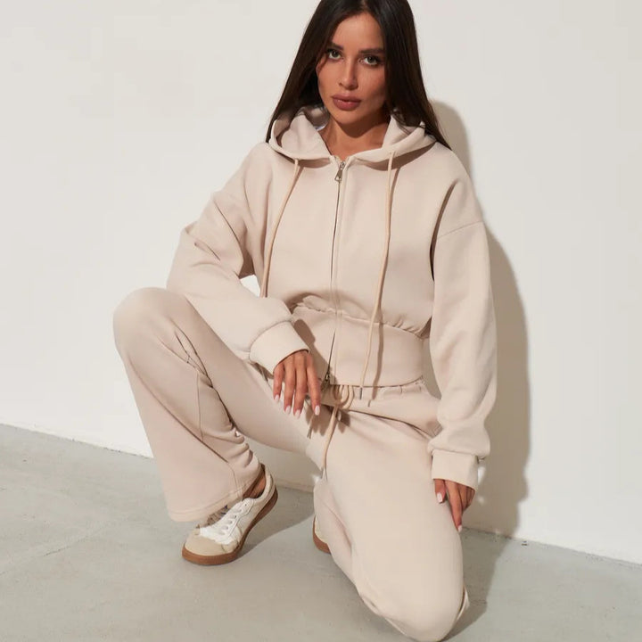 Damen kurzes Kapuzen-Zipshirt mit tailliertem Tunnelzug und weit geschnittene High-Waist-Loungehose Drune