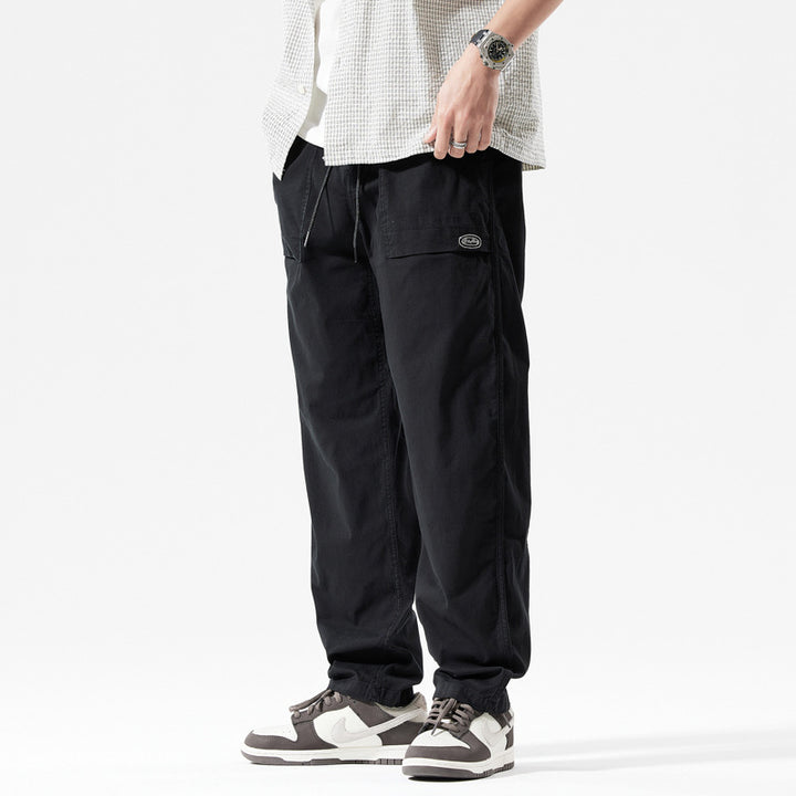 Herren Baggy-Cargo-Hose im Workwear-Look mit elastischem Kordelbund, aufgesetzten Klapptaschen und verstärkten Nähten Drune