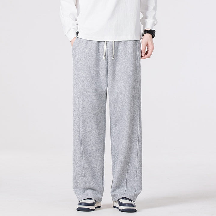 Herren Freizeit-Jogginghose im Oversize-Schnitt mit elastischem Kordelbund & markanter Seitennaht Drune