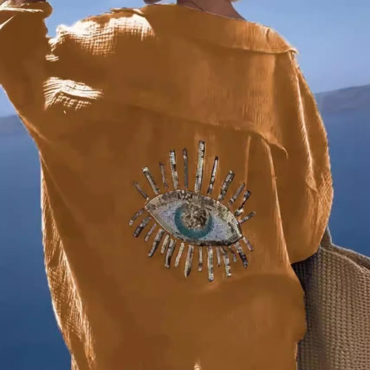 Damen lässige Bluse mit einzigartigem Augenmotiv und gestickten Akzenten Drune