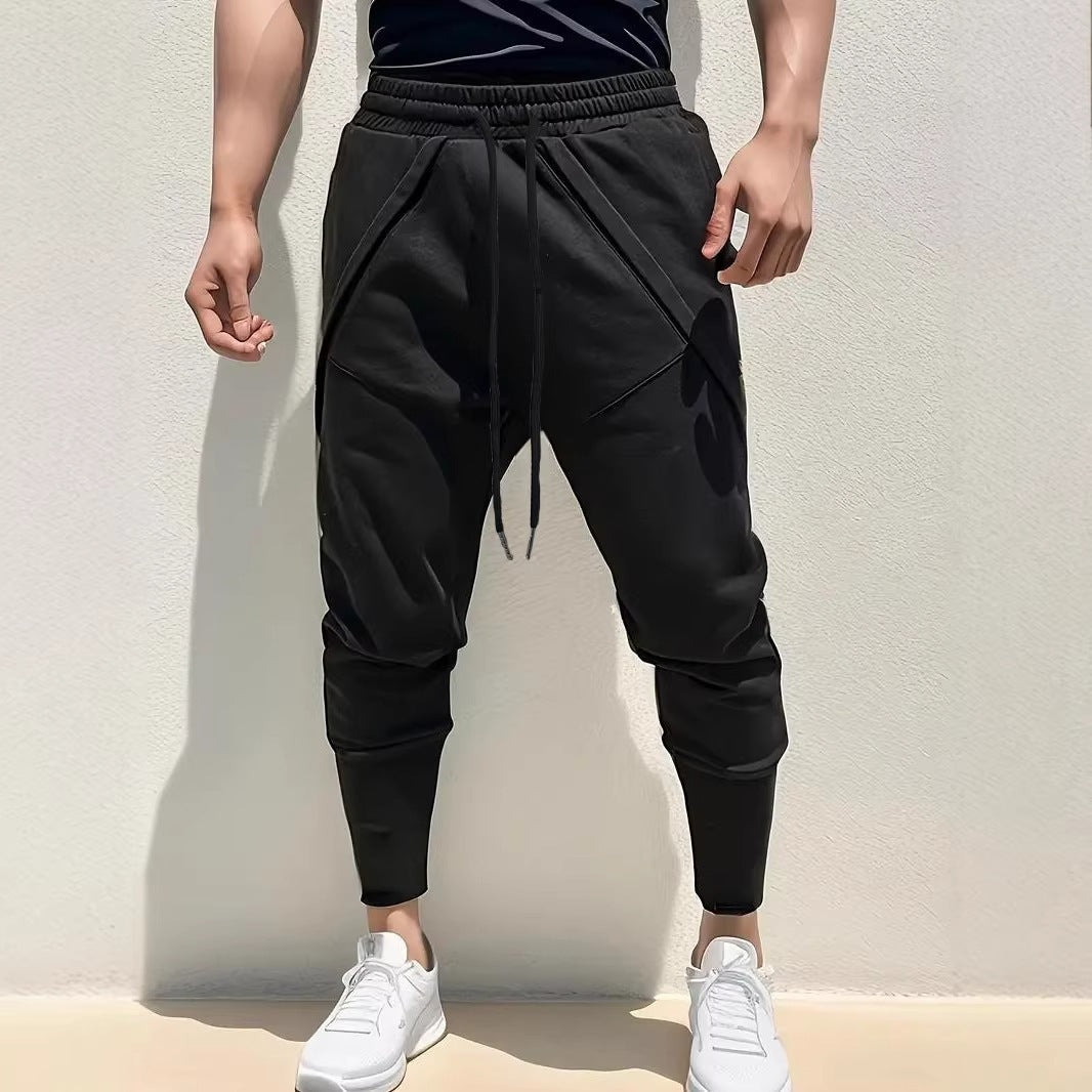 Herren Tapered-Jogginghose mit tiefem Schritt, elastischem Bund & diagonalgesetzten Taschen Drune