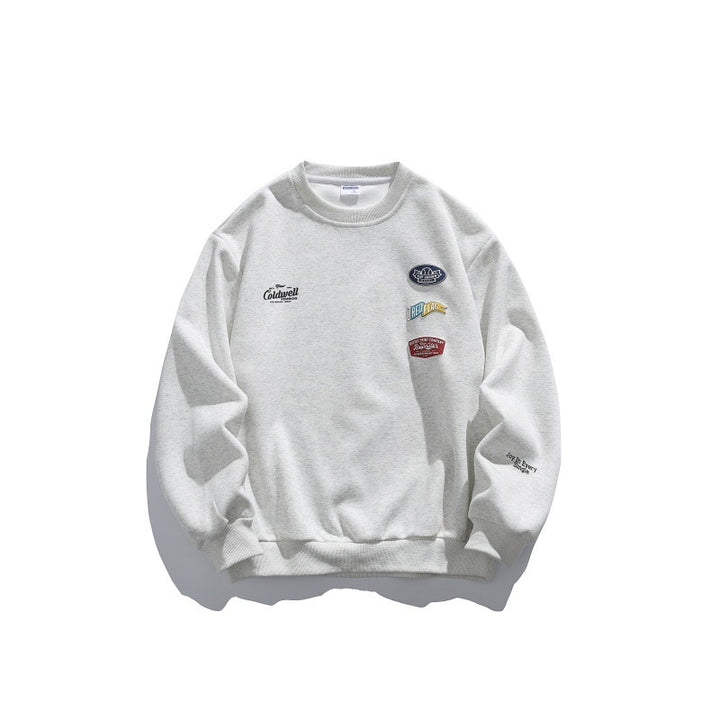 Unisex Oversize-Pullover mit Rundhalsausschnitt, Badge-Applikationen und gerippten Bündchen Drune
