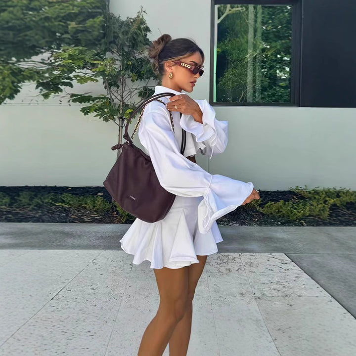 Damen modisches kurzämliges Set aus fließendem Material mit cropped Bluse und weit schwingendem Rock Drune