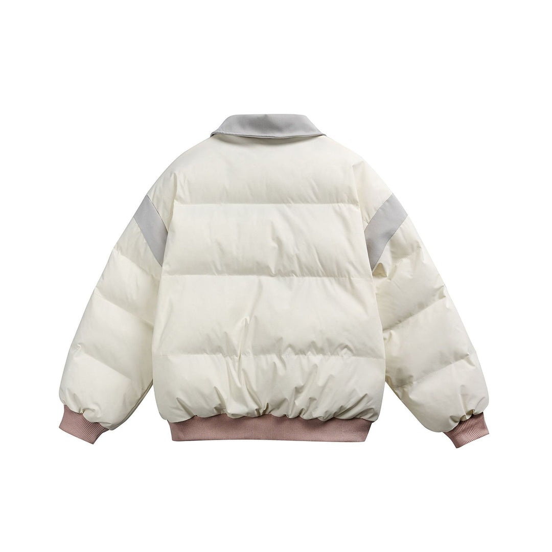 Damen Kurz geschnittene wattierte Blousonjacke mit kontrastierendem Kragen und Stickdetails Drune