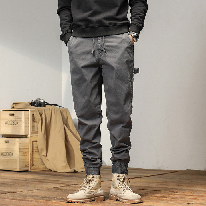 Herren Cargo-Jogginghose im Utility-Look mit elastischem Tunnelzugbund und verstärkten Pattentaschen Drune