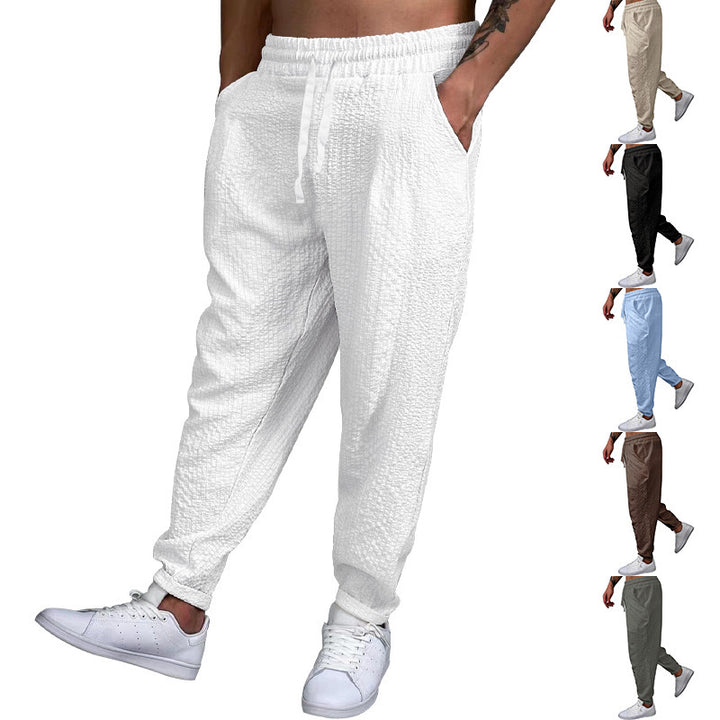 Herren Texturierte tapered Jogginghose mit Elastikbund, Tunnelzug & gerippten Knöchelbündchen Drune