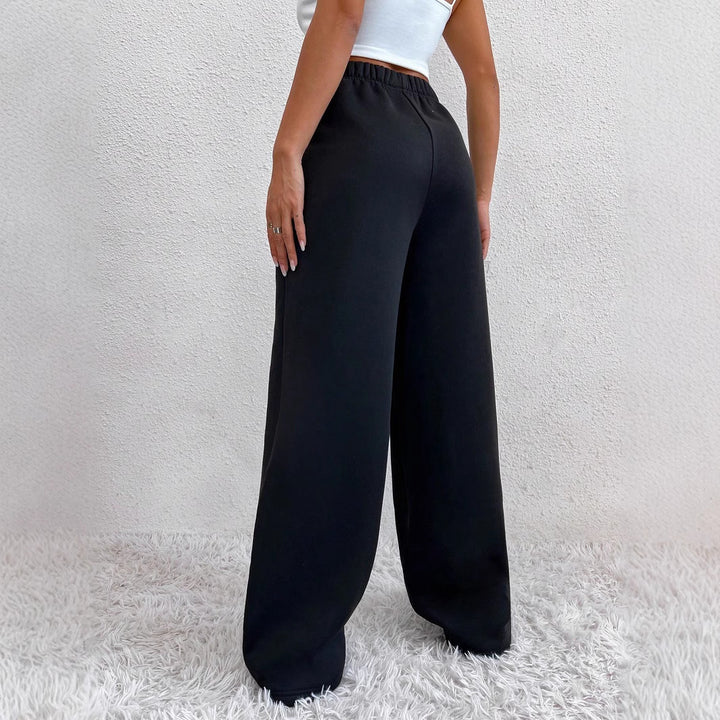 Damen nan weite Loungehose aus French Terry mit hohem Komfortbund, seitlichen Eingrifftaschen und fließendem Bein Drune