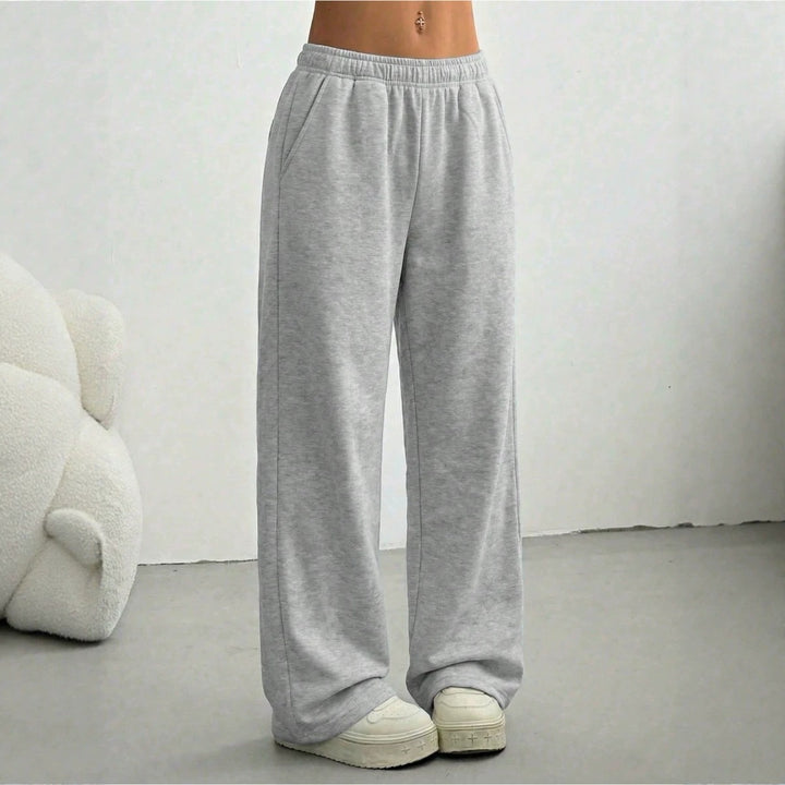 Damen nan weite Loungehose mit elastischem Bund, seitlichen Eingrifftaschen und fließendem Bein Drune
