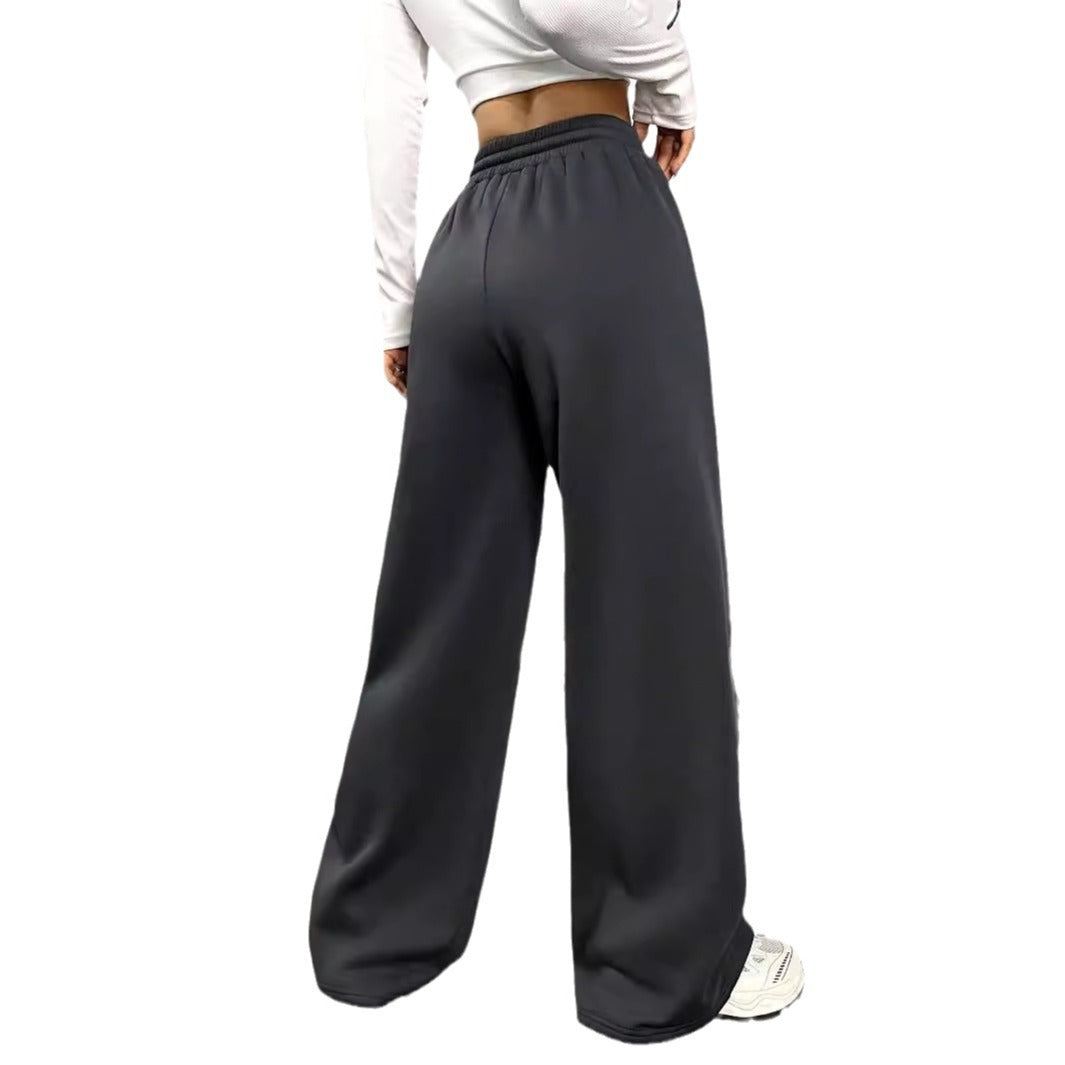 Damen weite Sporthose im urbanen Streetwear-Stil mit elastischem Bund und praktischen Taschen Drune