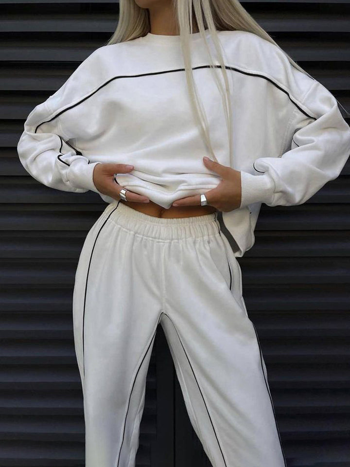 Damen cropped Sweatset mit weitem Arm, hochtaillierter Jogginghose und kontrastpaspeln Drune