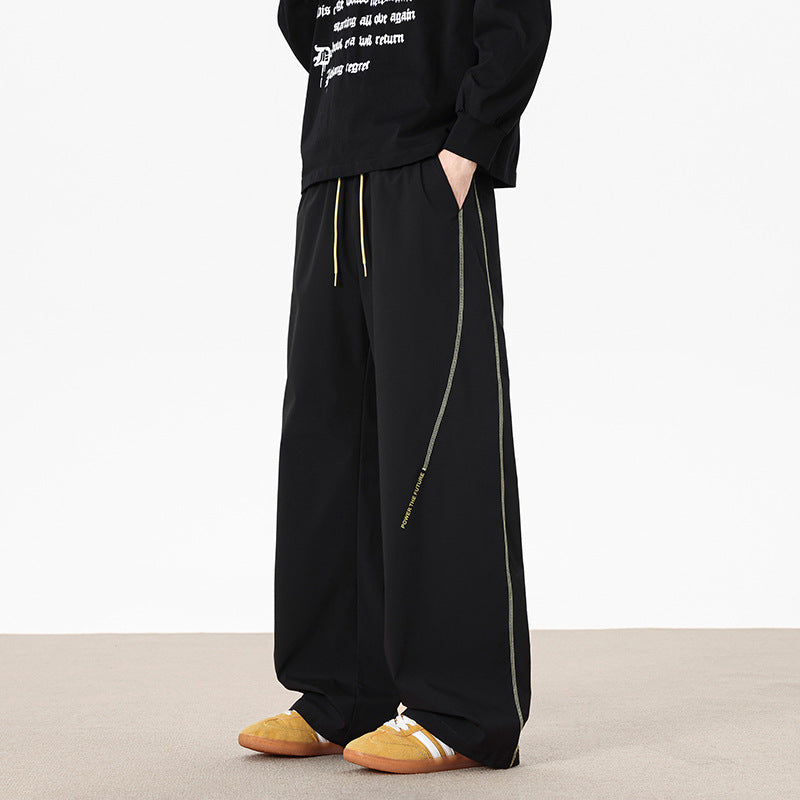 Herren Weitgeschnittene Sporthose mit reflektierenden Details