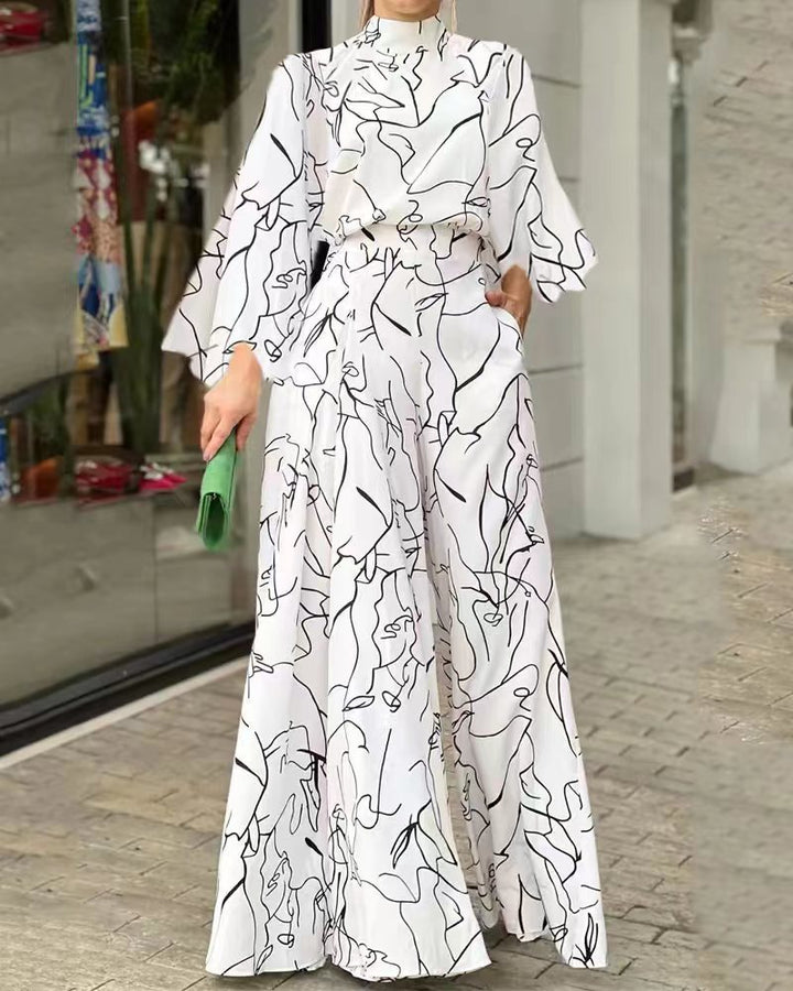 Damen Eleganter Longline Jumpsuit mit Stehkragen, Ballonärmeln und Seitentaschen Drune