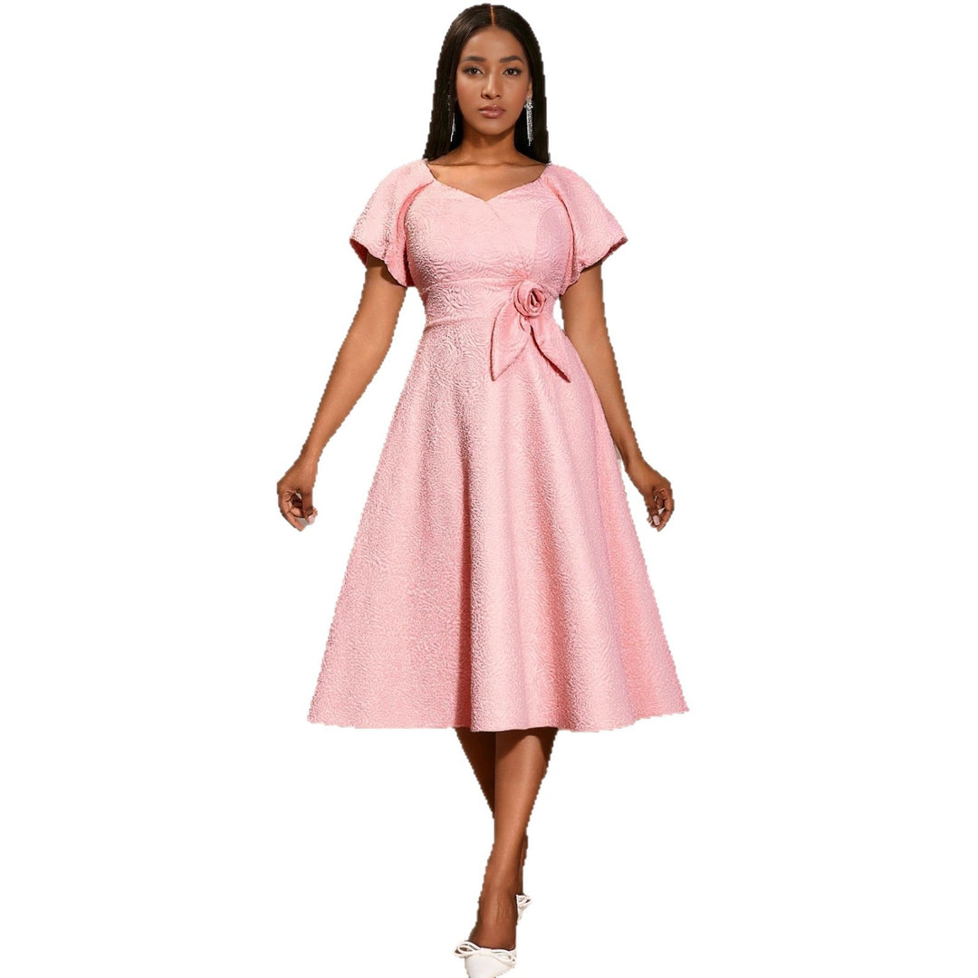 Damen elegantes Kleid mit Schößchen, Blumenapplikation und Puffärmeln Drune