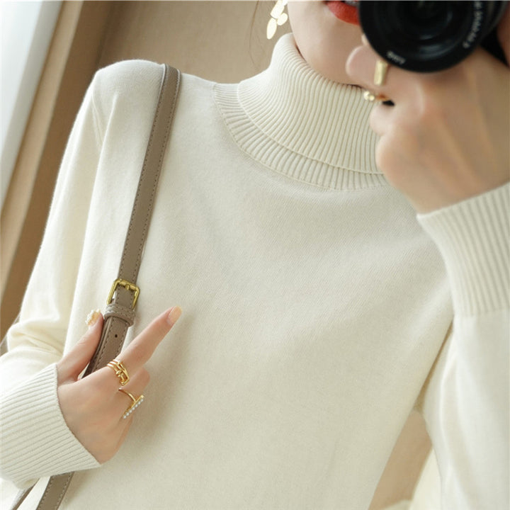 Damen Minimalistischer Feinstrick-Rolli mit hohem Rippkragen und schmaler Passform Drune