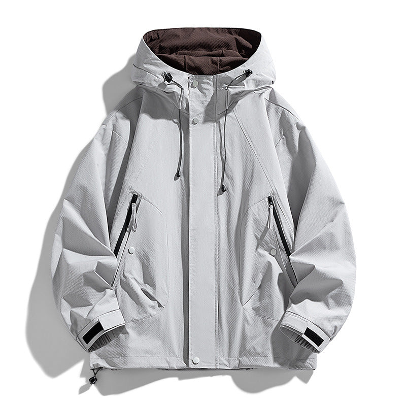 Unisex leichte winddichte Outdoorjacke mit Kapuze, wasserabweisender Außenhülle und verstellbarem Saum Drune