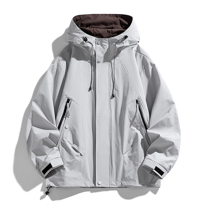 Unisex leichte winddichte Outdoorjacke mit Kapuze, wasserabweisender Außenhülle und verstellbarem Saum Drune