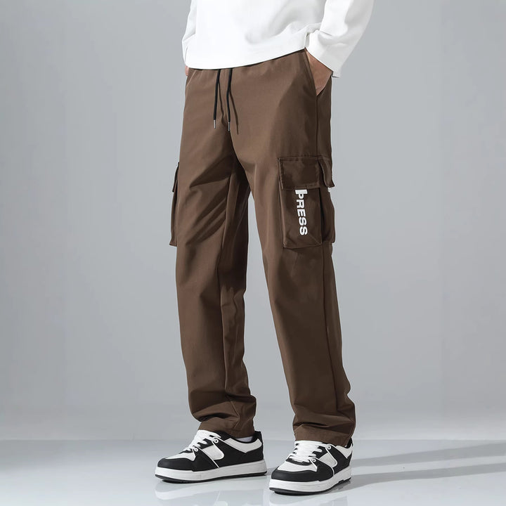 Herren Tapered Cargo-Jogginghose mit elastischem Tunnelzug, multifunktionalen Klapptaschen & ergonomischen Nähten Drune