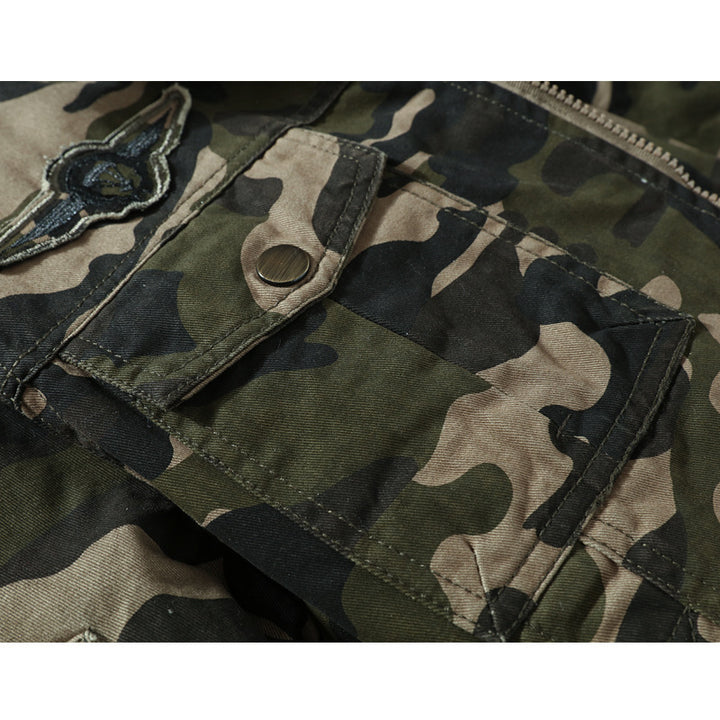 Herren Fieldjacke im Tarnmuster mit Teddyfleece‑Innenfutter, Mehrfachtaschen und Schulterklappen Drune