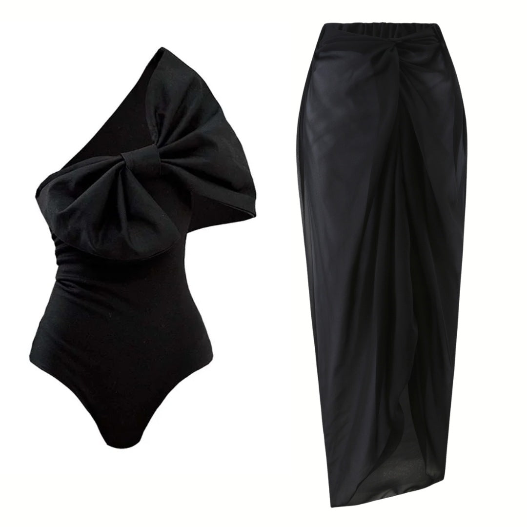 Damen Einschnitt Badeanzug mit voluminösem Schleifen-Detail und elegantem Wickelrock Drune
