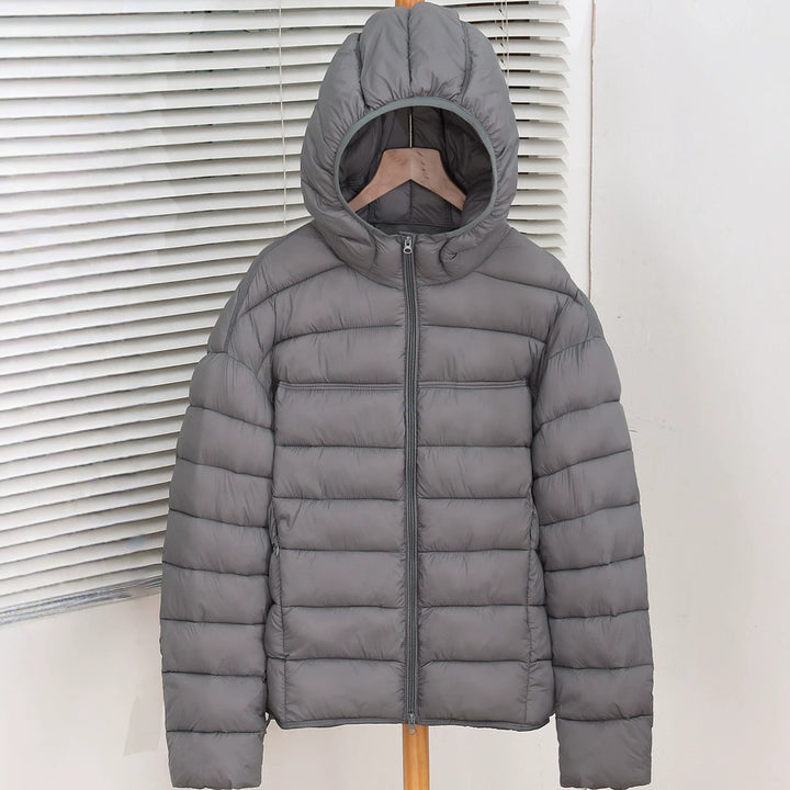 Damen Leichte Kapuzen‑Pufferjacke mit schmaler Quersteppung und ergonomischer Kapuze Drune