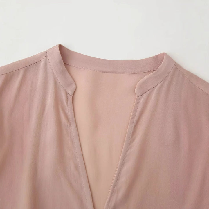 Damen nan elegante Bluse mit Perlenknopfleiste, Taillenzug und leichtem Schößchen Drune