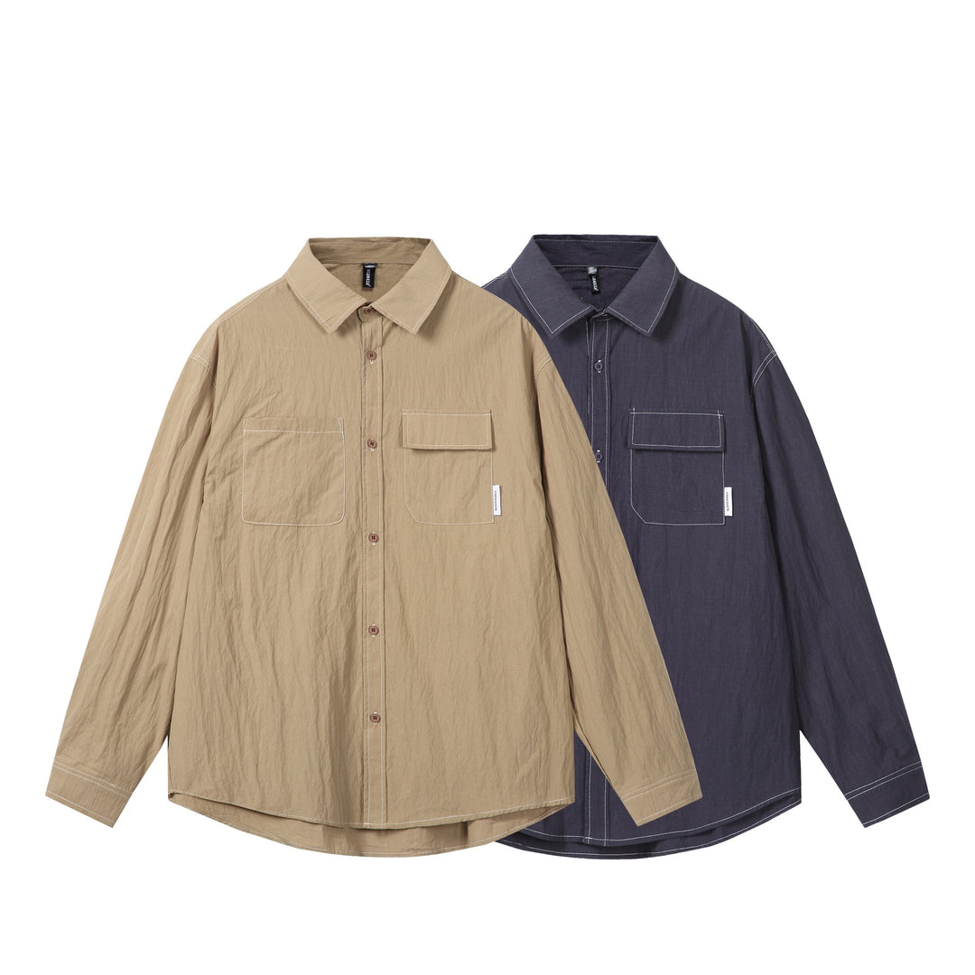 Unisex Oversize-Hemdjacke mit markanten Kontrastnähten und aufgesetzten Brusttaschen Drune
