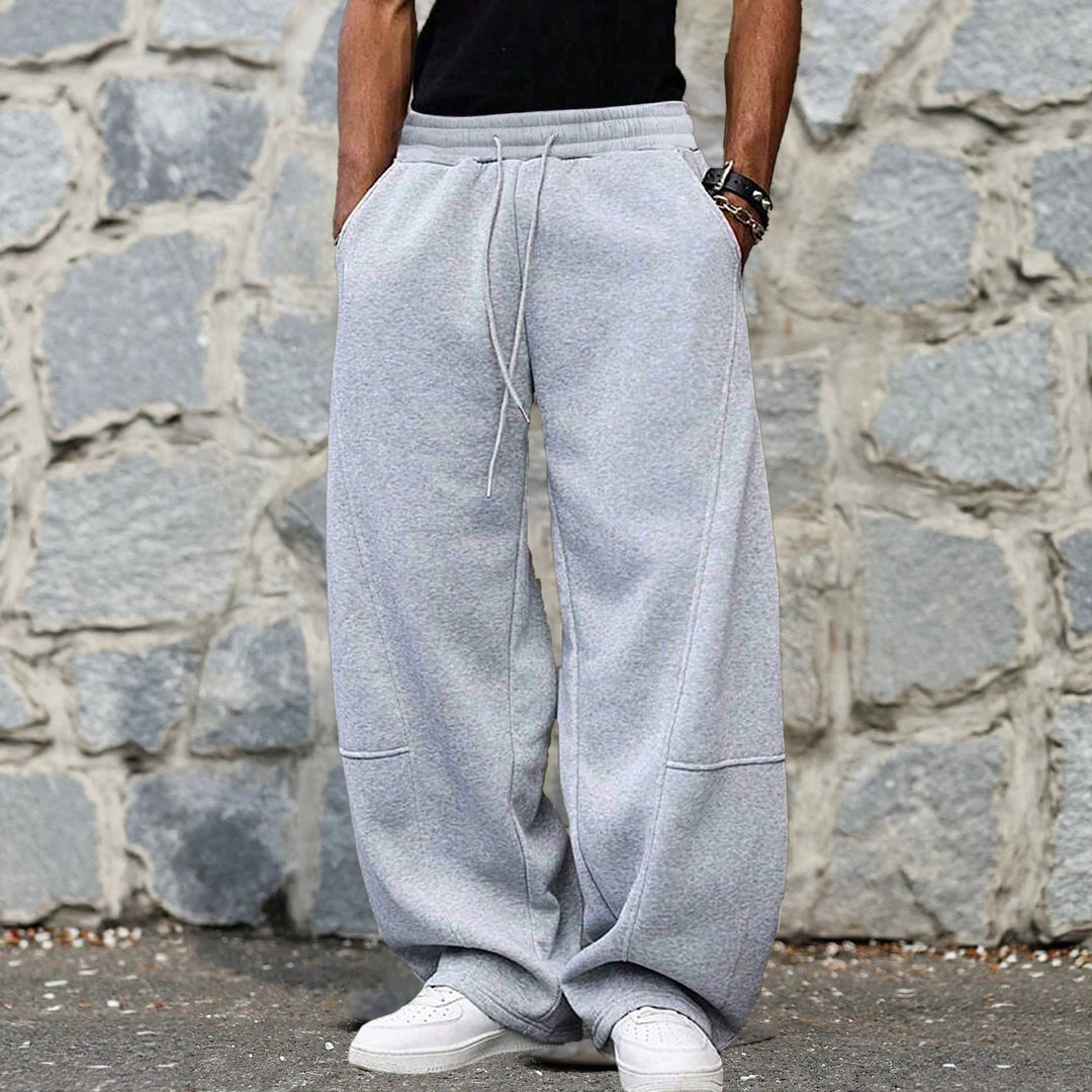Herren weite Sweatpants im Baggy Cut mit elastischem Bund, Tunnelzug und Eingrifftaschen Drune