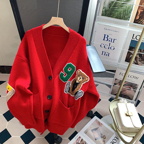 Damen oversized Strickjacke mit Bärenapplikationen und breiten Taschen Drune