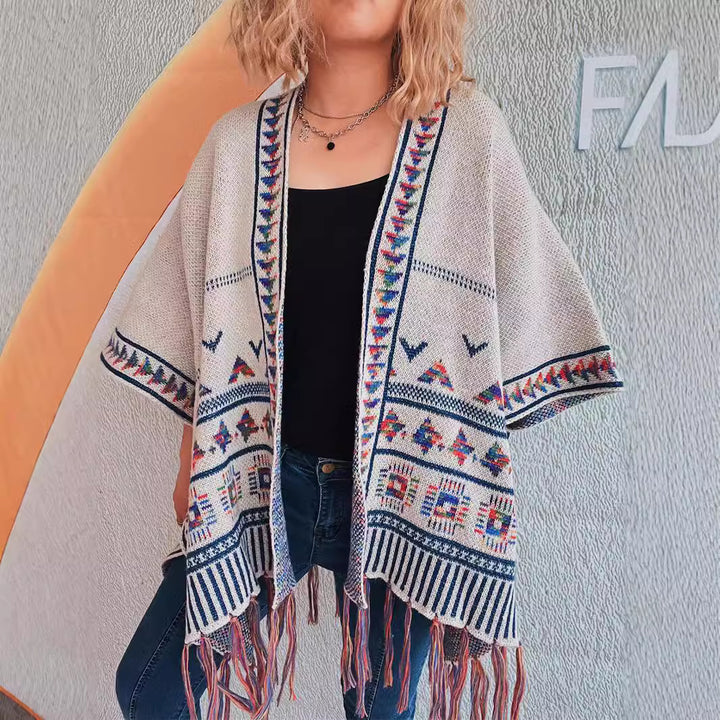 Damen modische Strickponcho mit fransenverzierter Kante und buntem Muster Drune
