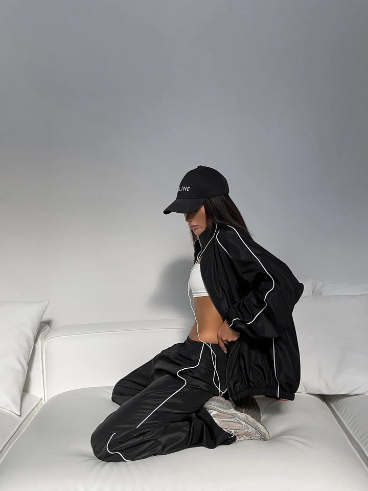 Damen sportives zweiteiliges Trainingsset mit Bomberjacke und weitem Jogginghose aus technischem Funktionsmaterial Drune